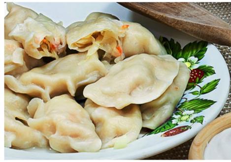 Dumplings with fried cabbage